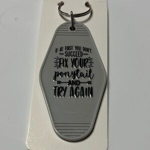 Gray Keychain with Motivational Quote